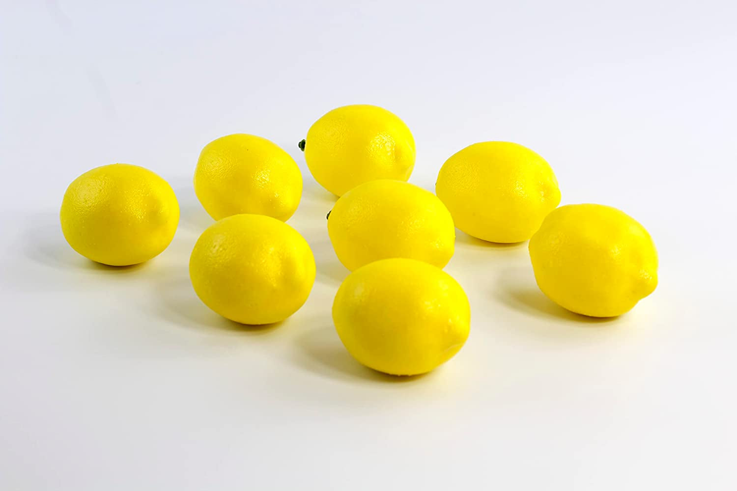 Life Size Artificial Lemon for Table Top, Kitchen Decorations. Bowl Filler and for Seasonal Decor. Size. 3'' Long X 2'' Wide (Set of 8)